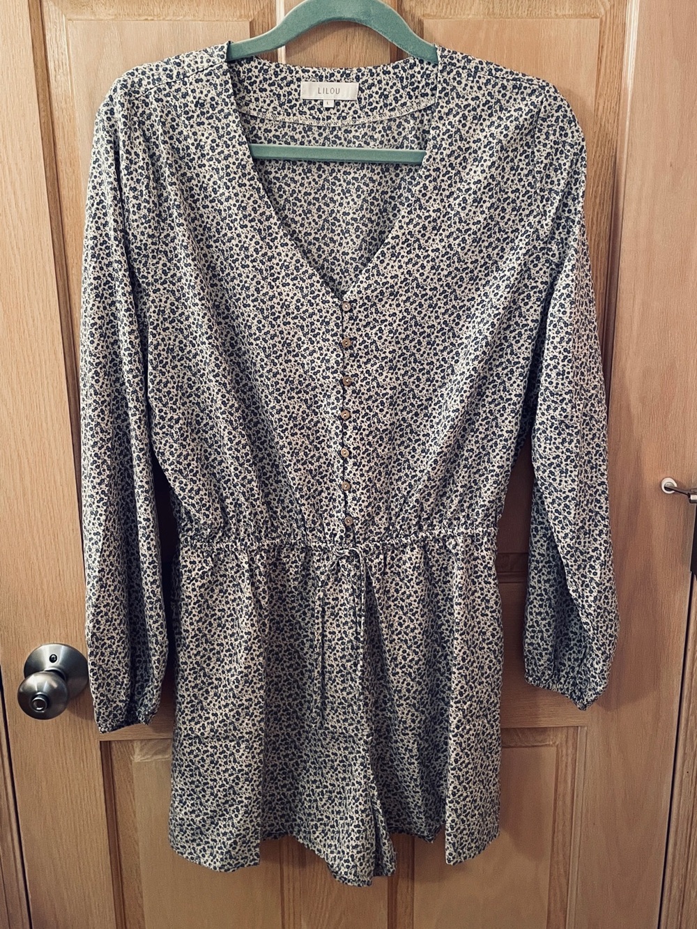 LILOU Blue Floral V-Neck Romper with Button Front